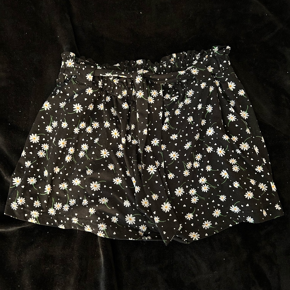 Black shorts with flower pattern